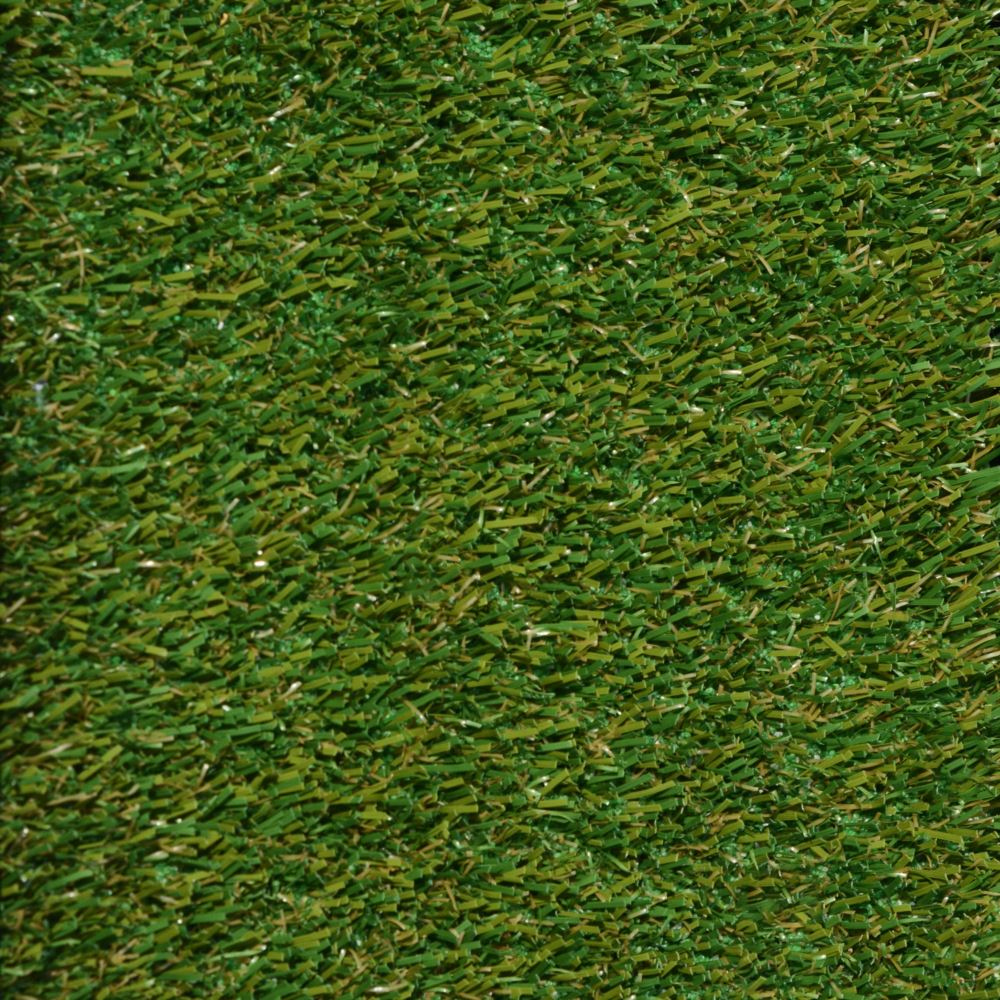 Close up shot of pet turf with green and brown grass strands